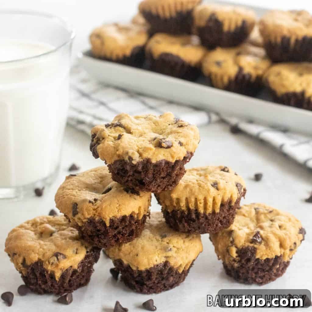 Decadent Brookie Bites Recipe: Chocolate Brownie + Cookie Bars 12 pyramid stack of brookie bites close up with milk glass and platter behind