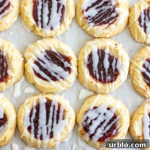 lemon raspberry cookie recipe with lemon glaze close up on parchment paper