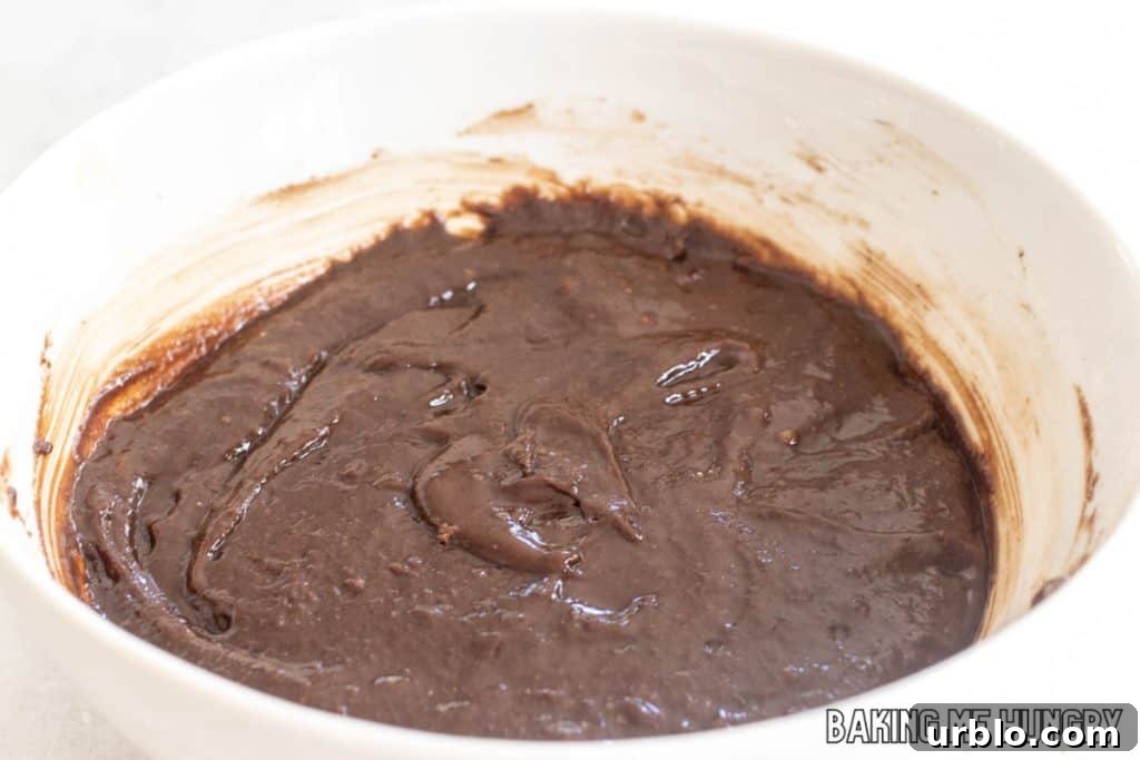 Decadent Brookie Bites Recipe: Chocolate Brownie + Cookie Bars 7 chocolate batter in bowl
