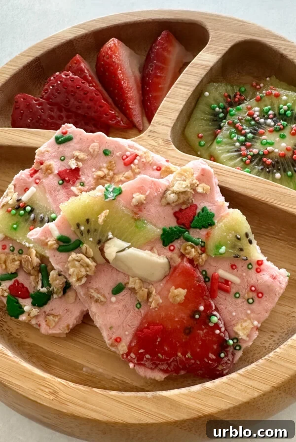 How to Make Gogurts: Homemade Yogurt Tubes Recipe 9 Strawberry yogurt bark served with fresh fruits.