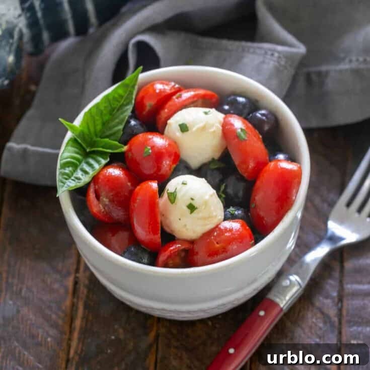 Blueberry Caprese Salad in a small salad bowl.