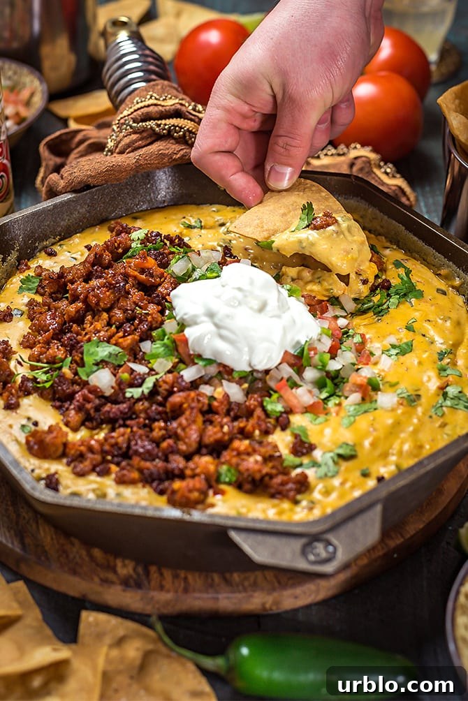 Creamy Chorizo Queso Dip Recipe for Game Day and Parties 7 Chorizo Queso Dip. This is the ultimate, no fake cheese, no fuss cheese dip. | hostthetoast.com