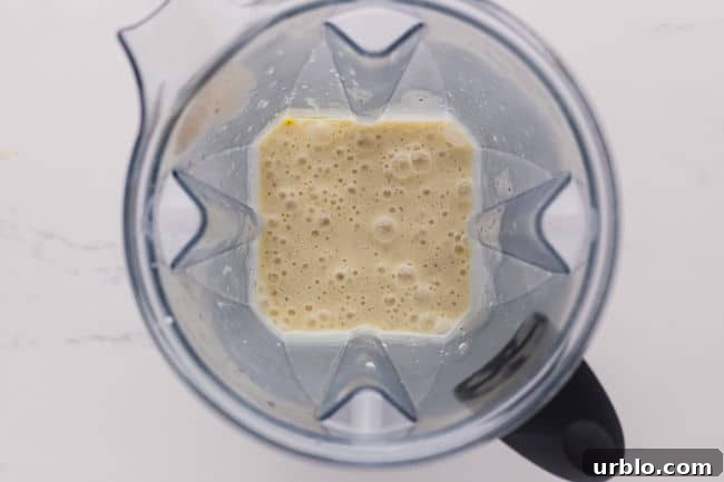 Blended potatoes and half and half in a blender.