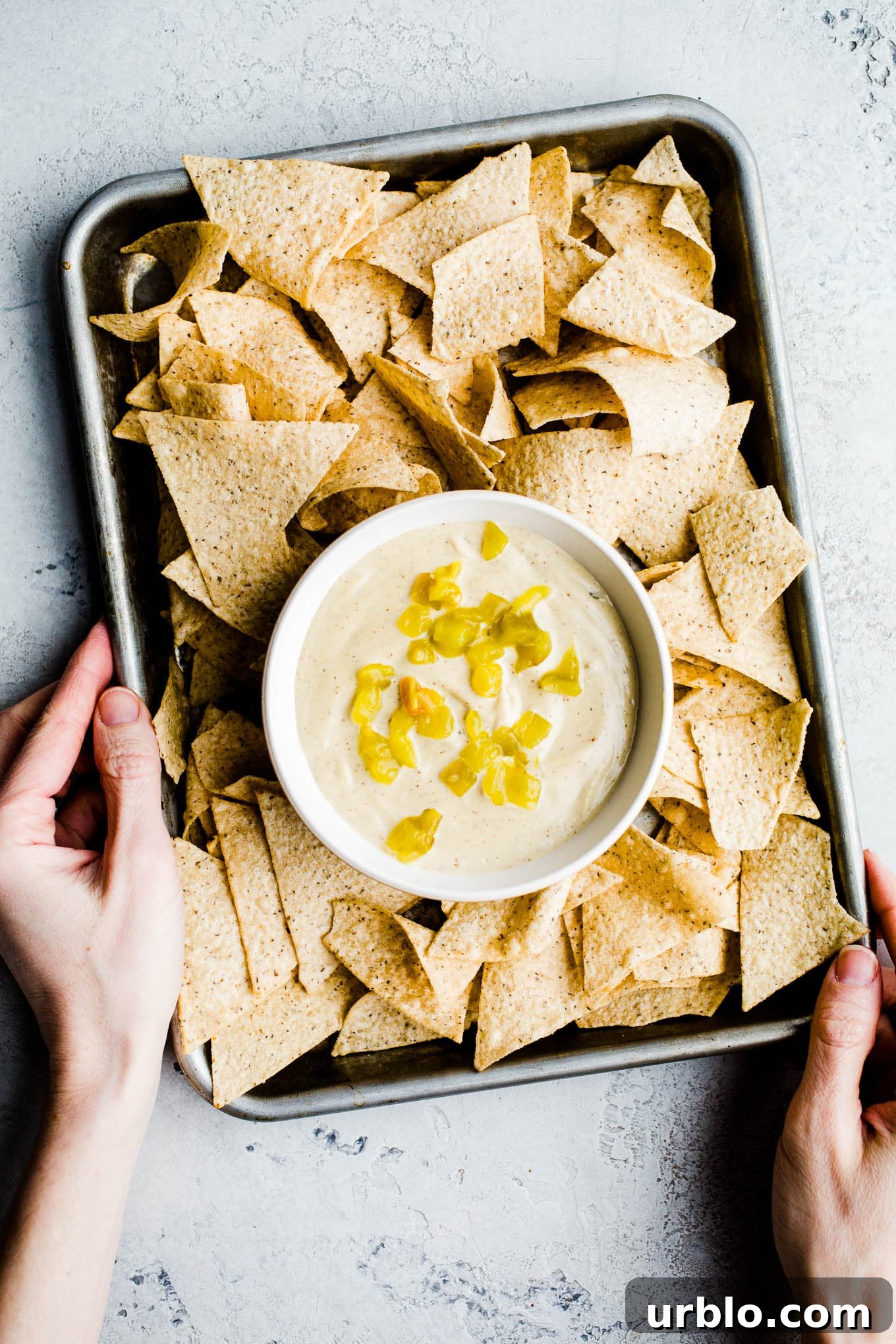 Vegan queso blanco with hatch chilis in bowl