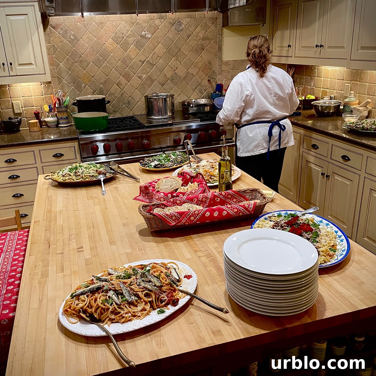 Several pasta dishes on a wood countertop at the Savory Spoon Cooking School in Door County.