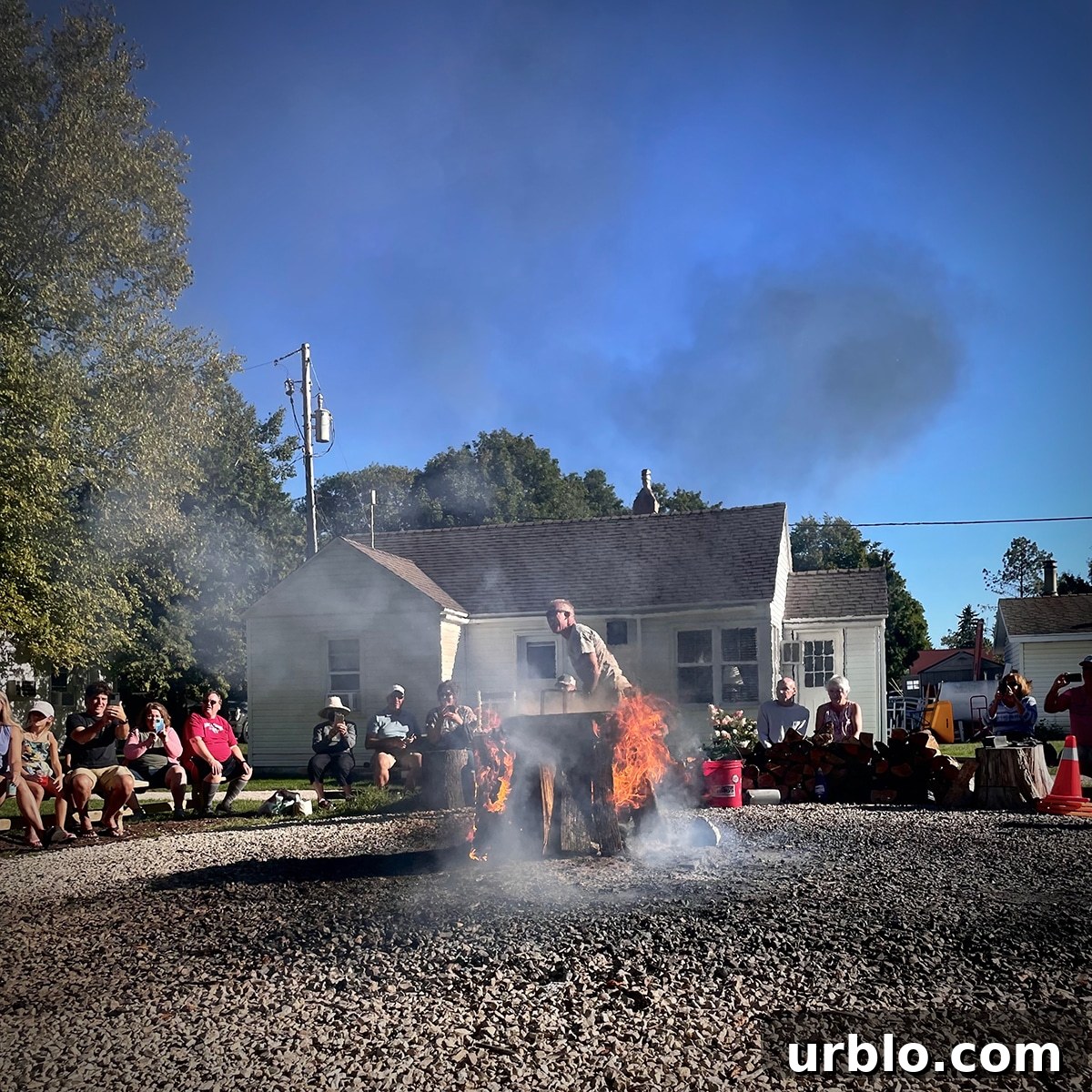 A huge cast iron pot set over an open flame during a fish boil at The Old Post Office restaurant in Ephraim, Door County.