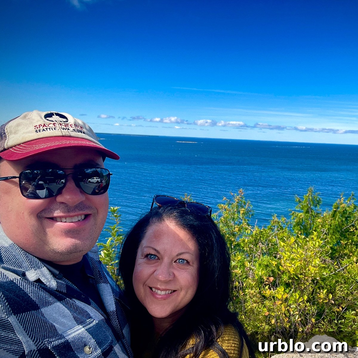 Standing on an overlook with Lake Michigan in the background on a stop during our Door County Trolley Tour.