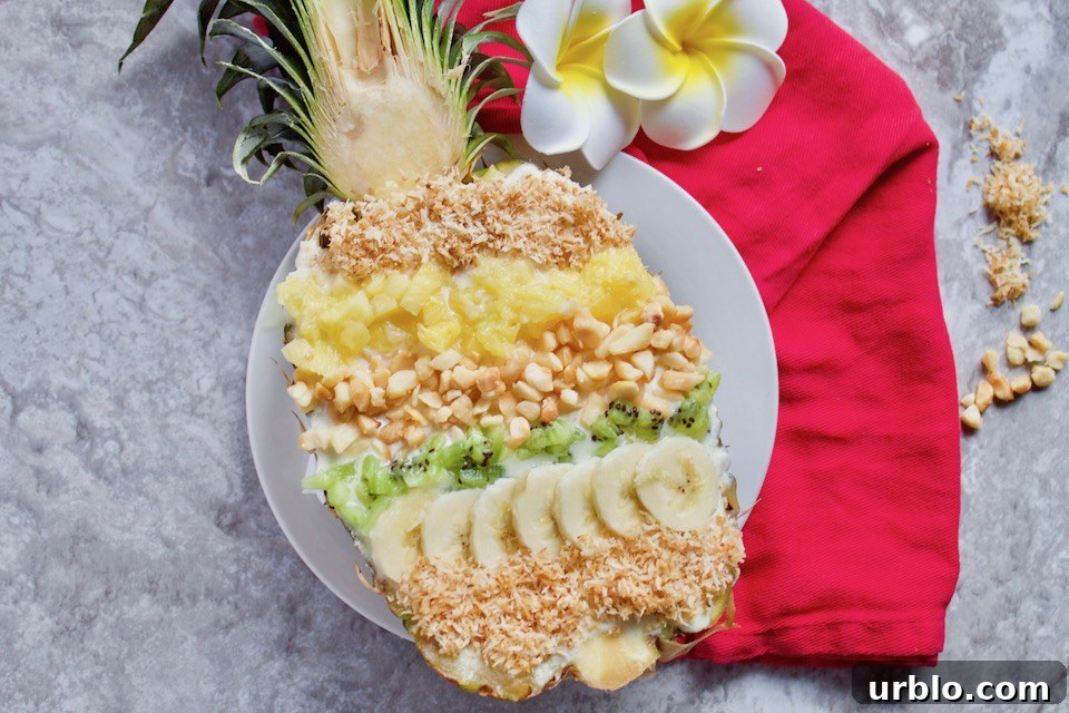 Pineapple Smoothie Recipe with Toppings In Pineapple