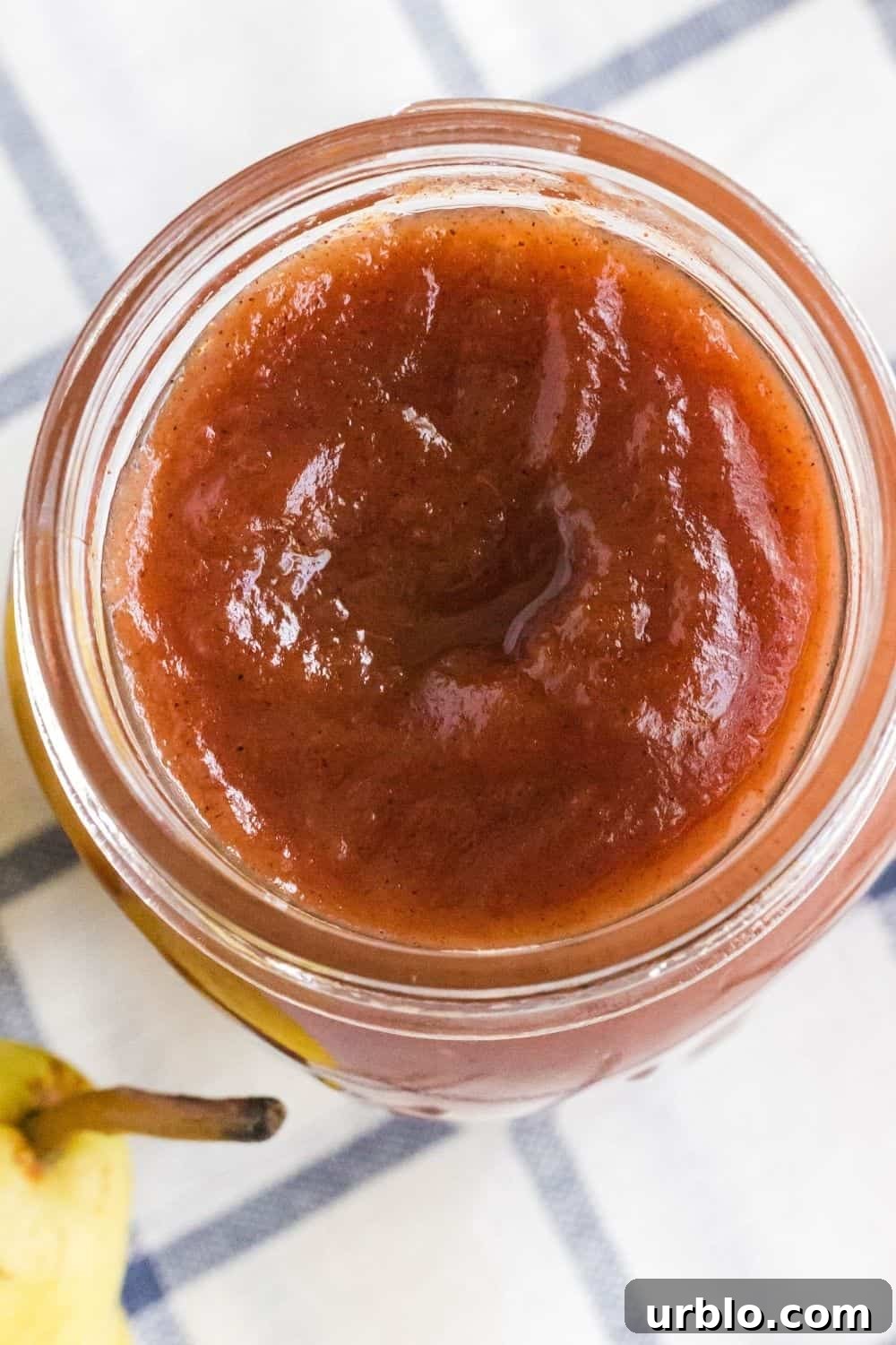 overhead view of the mouth of a jar of homemade pear butter