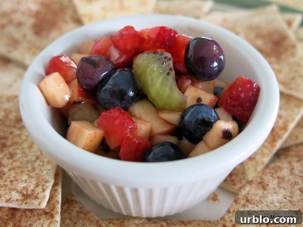 Low-Sugar Apple-Berry Salsa with Cinnamon Chips 8 Fruit Salsa in single serve bowl with Cinnamon Chips around it