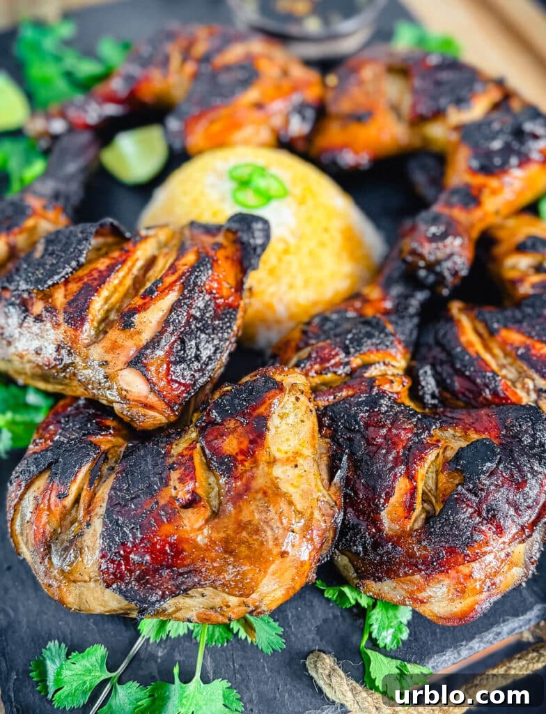 chicken Inasal on a cutting board with rice