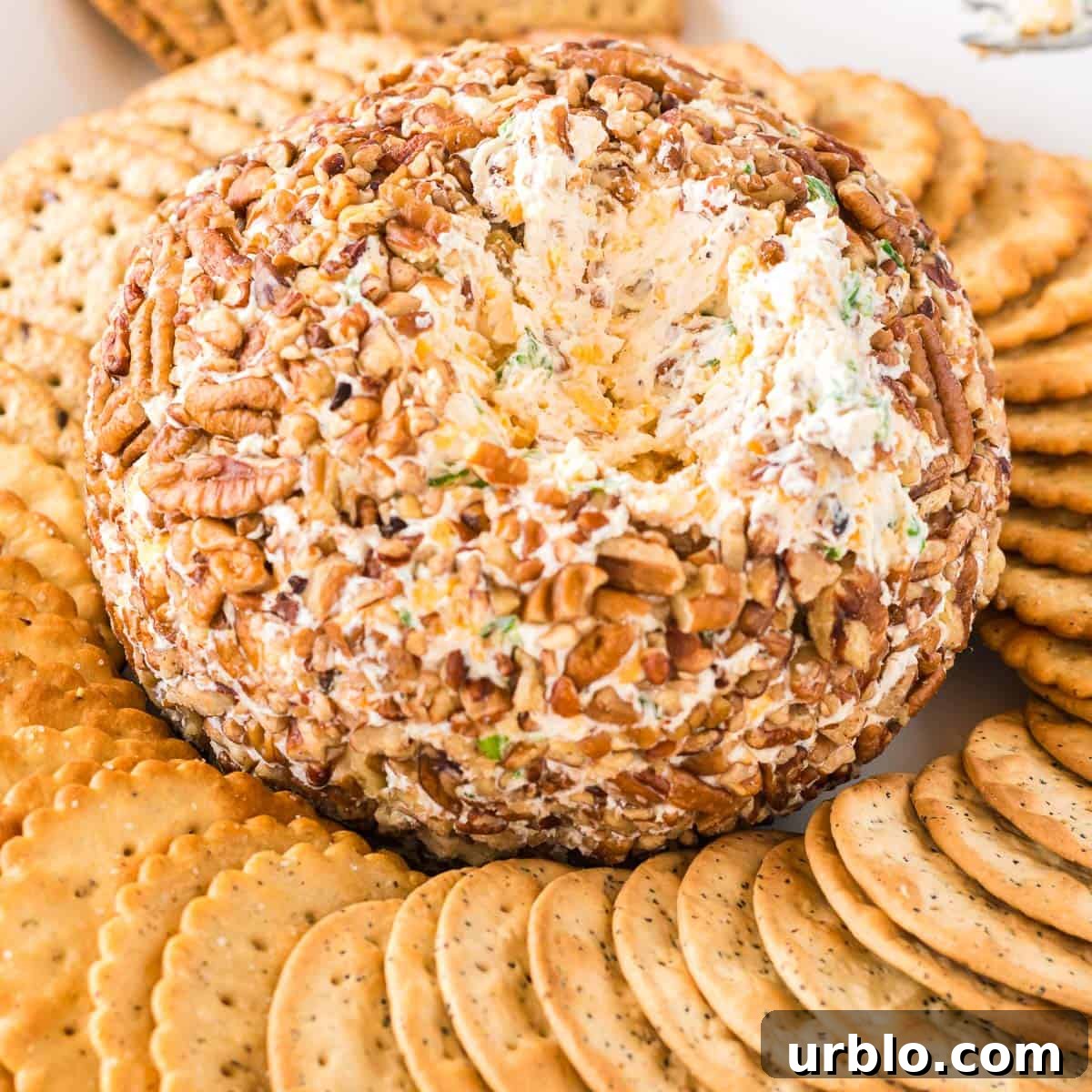 Classic Creamy Cheese Ball Recipe: Party Appetizer Guide 13 cheese ball with a chunk missing to show the inside