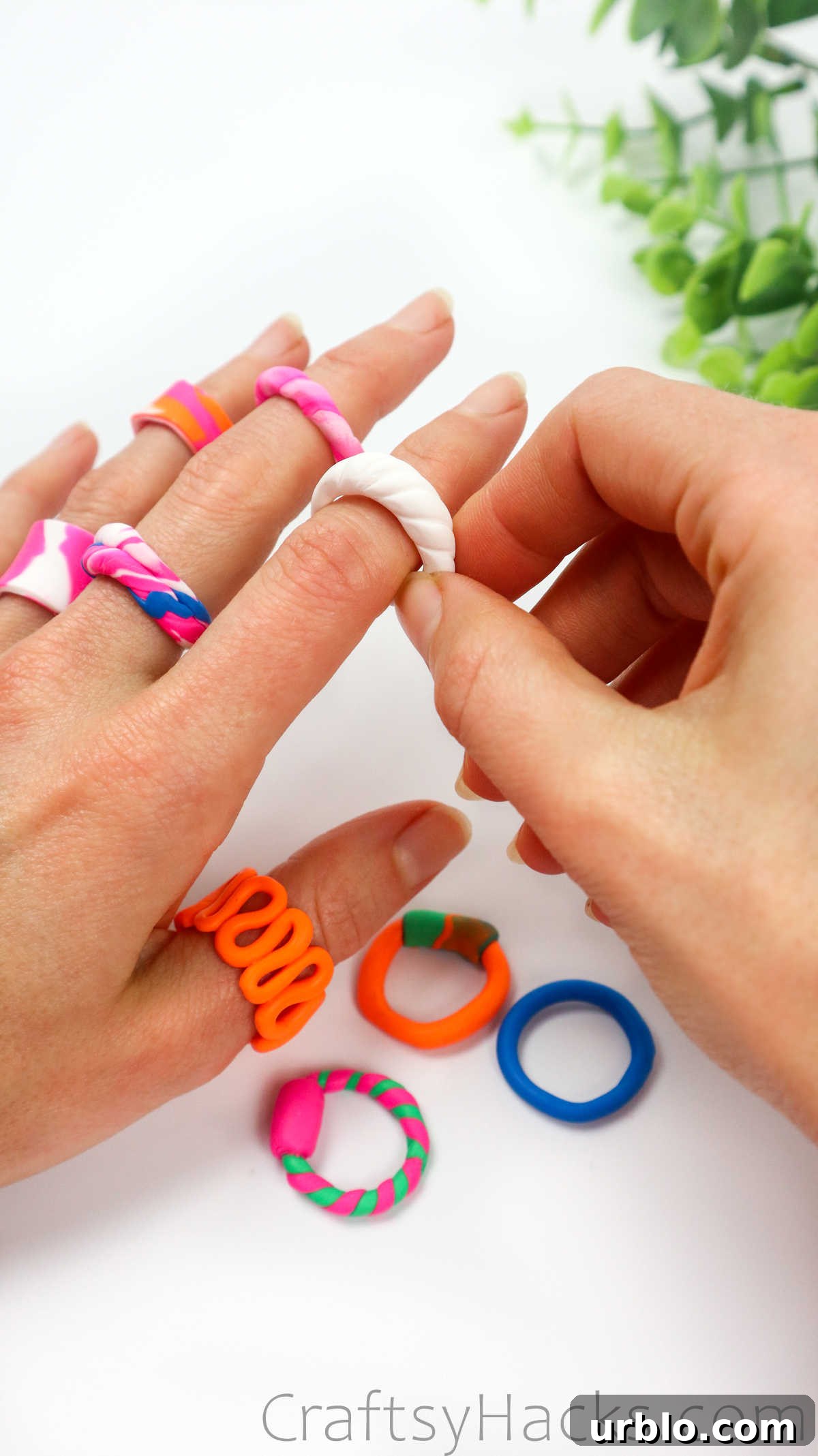 clay rings on finger