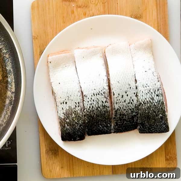 Resting salmon on a plate.