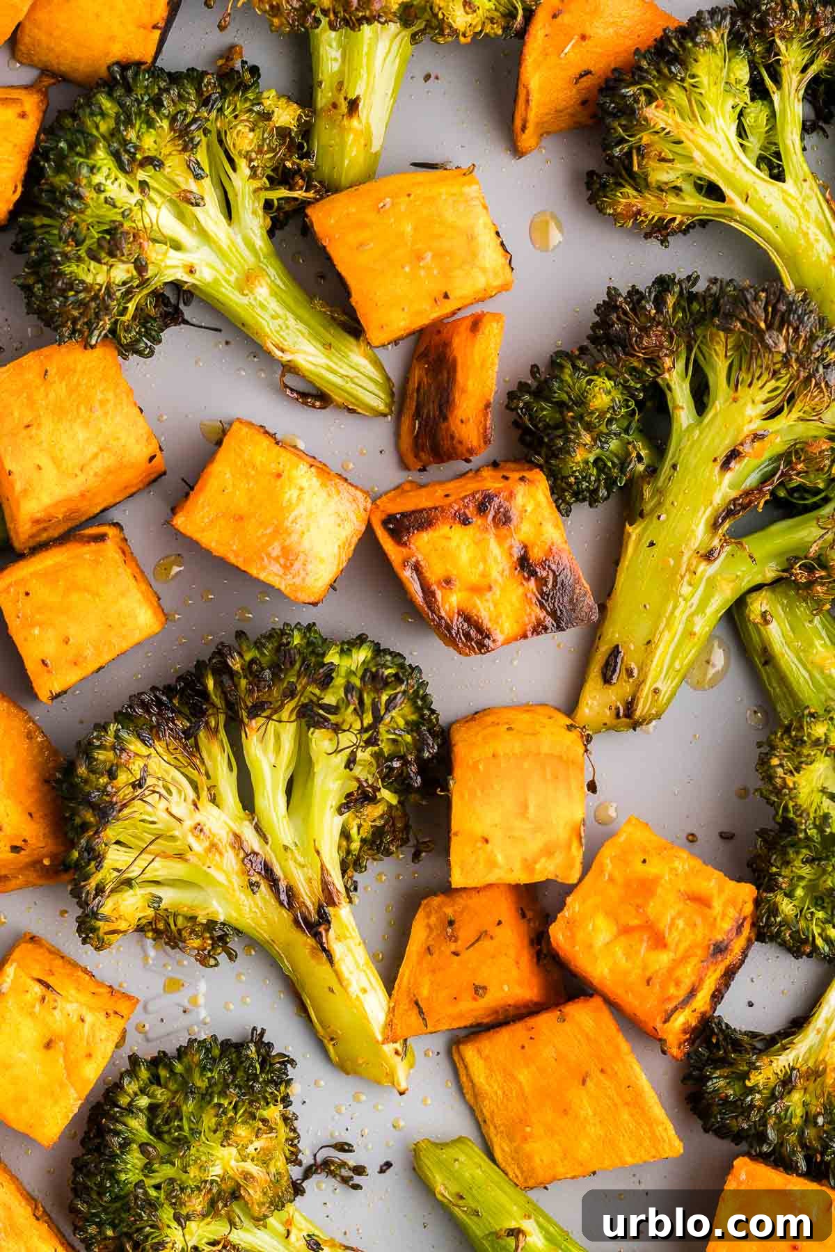roasted broccoli and sweet potatoes recipe on a sheet pan