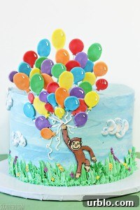 Very Hungry Caterpillar Birthday Cake Ideas and Decorating Tips 4 Close up of a Curious George Birthday Cake.