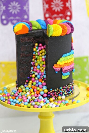 Very Hungry Caterpillar Birthday Cake Ideas and Decorating Tips 5 Chocolate pinata cake cut open, with colorful candy spilling out