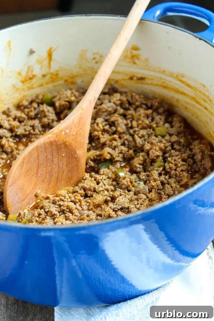 Cooking mixture in Dutch oven.