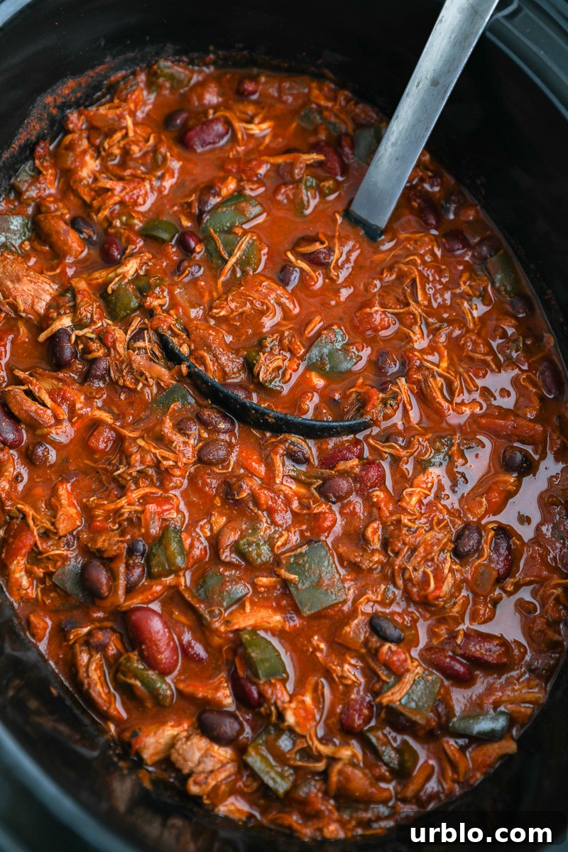 A crockpot filled with smokey chipotle chicken chili
