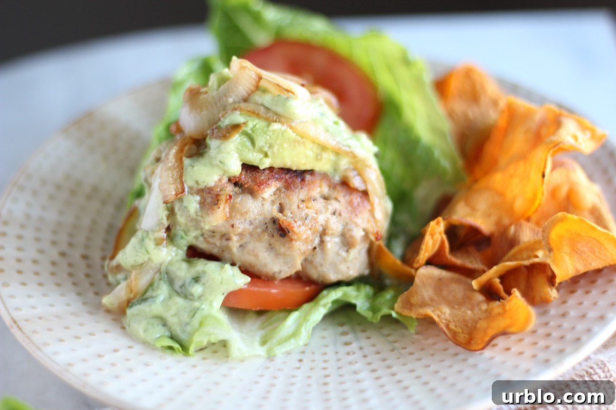 Stuffed Bacon Turkey Burgers - bacon-loaded turkey burgers are stuffed with dairy-free cheese and topped with caramelized onions and avocado ranch! TO DIE FOR! | fedandfulfilled.com
