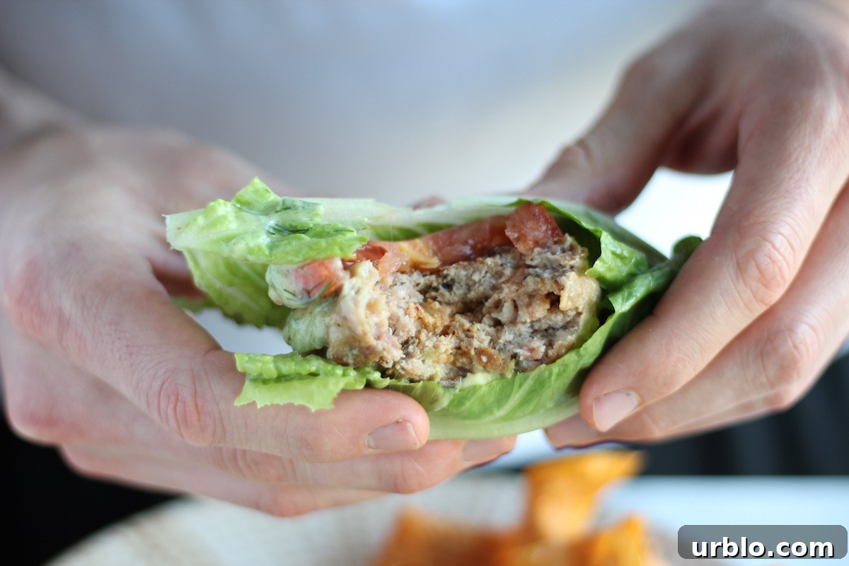 Stuffed Bacon Turkey Burgers - kick up your turkey burgers with smokey bacon, creamy cheese, caramelized onions, and avocado ranch dressing! SO GOOD! | fedandfulfilled.com