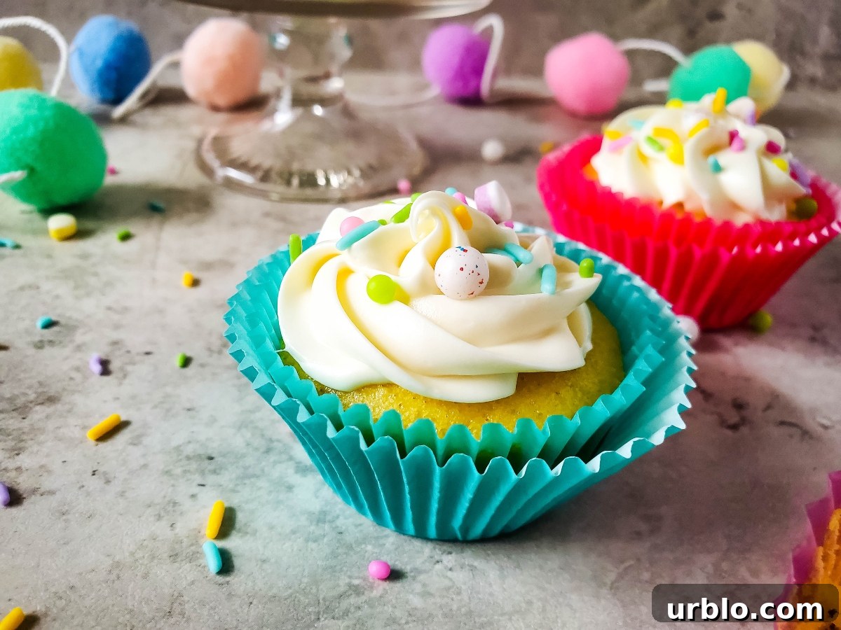Sprinkle cupcakes with cream cheese frosting Sprinkle cupcakes with cream cheese frosting