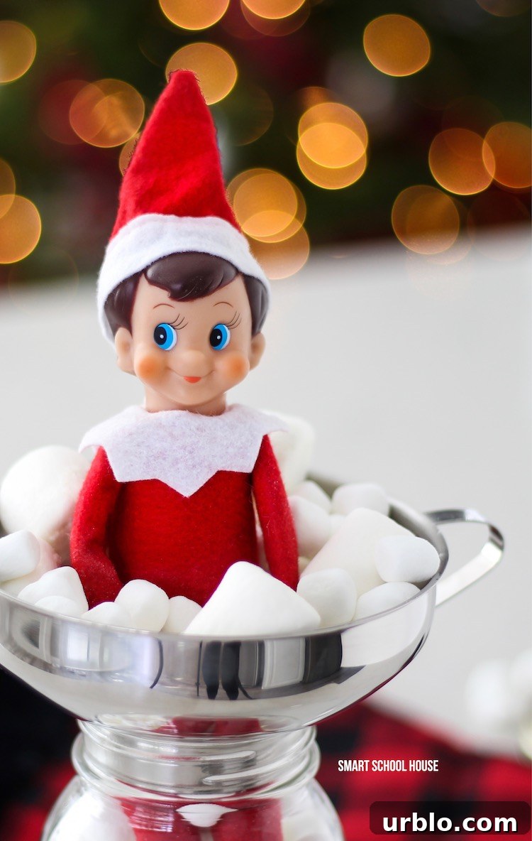 Elf on the Shelf in a Jar of Marshmallows for Christmas.