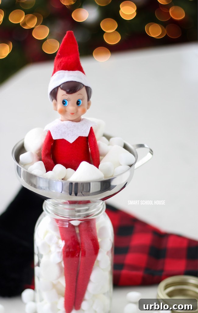 Elf on the Shelf in a Jar of Marshmallows for Christmas.