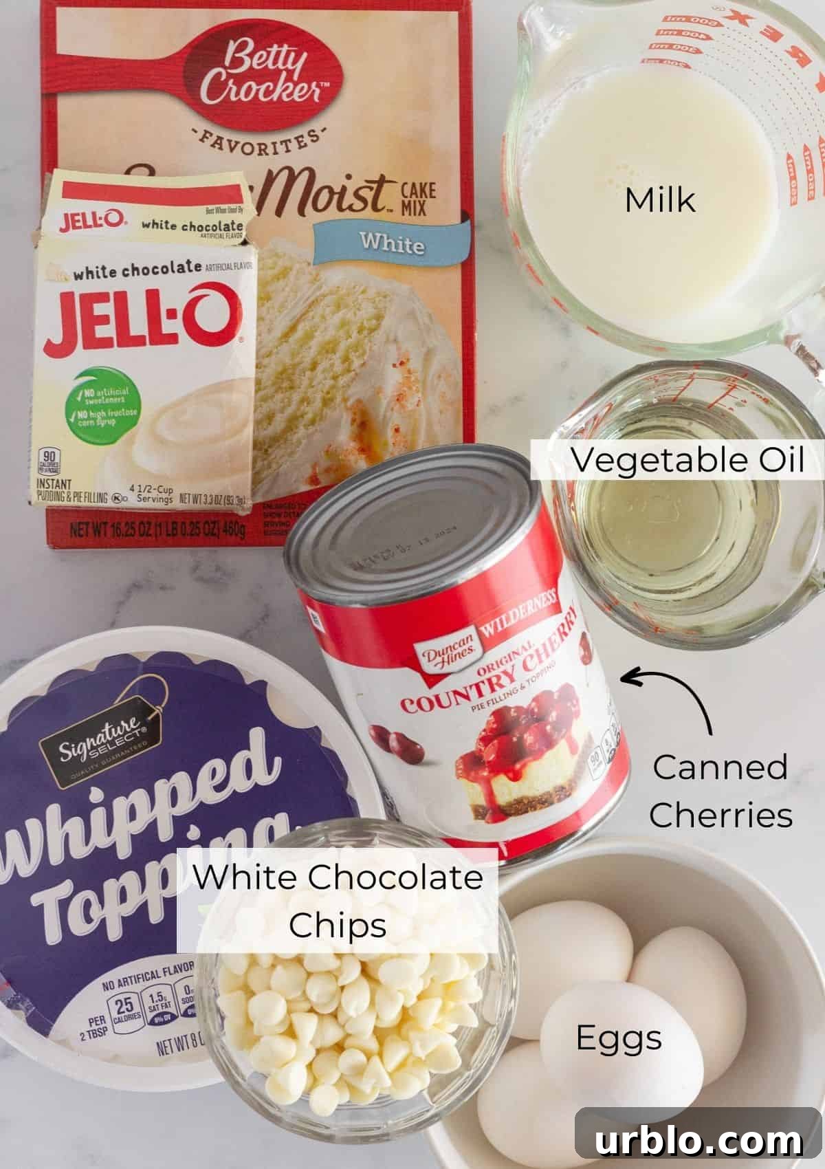 The ingredients needed to make a white forest cake.