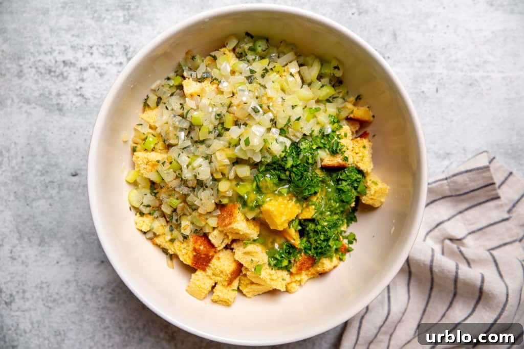 Gluten-Free Cornbread Stuffing Recipe (Cornbread Dressing) 8 All of the ingredients for the cornbread stuffing recipe in a large bowl.