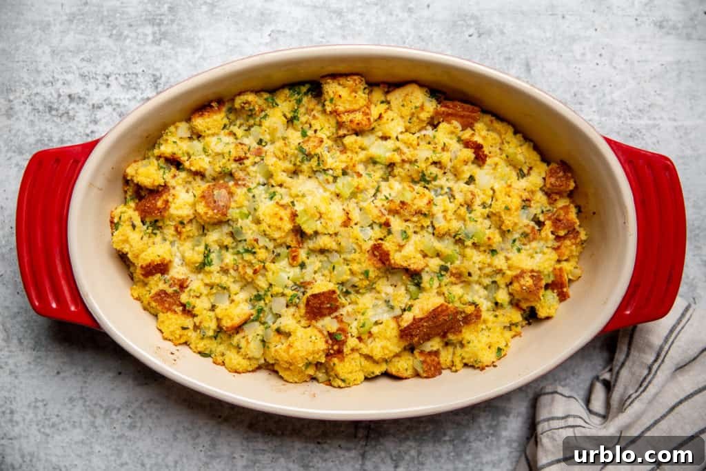 Gluten-Free Cornbread Stuffing Recipe (Cornbread Dressing) 10 The cooked cornbread stuffing in a baking dish.