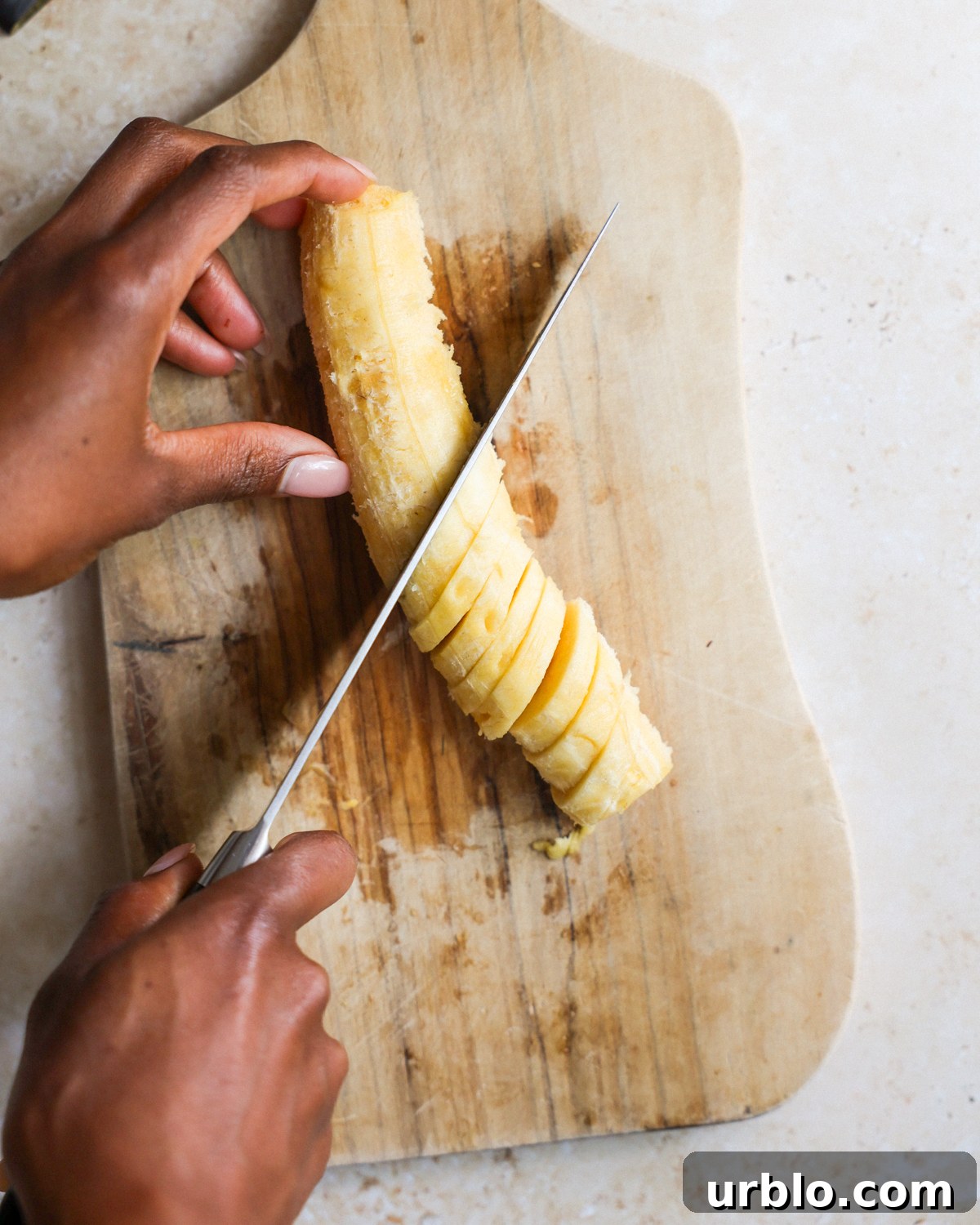 overhead slicing the plantain