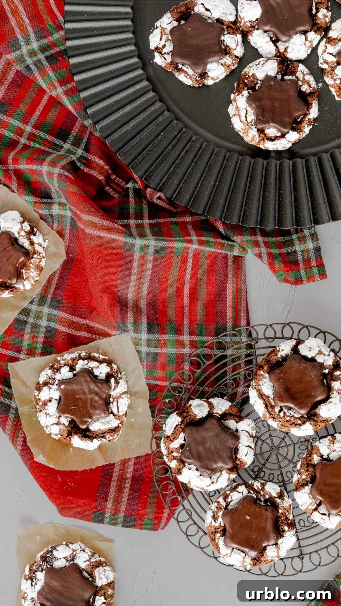Bird's eye view of Hot Cocoa Crinkle Cookies with a York peppermint patty in the center.