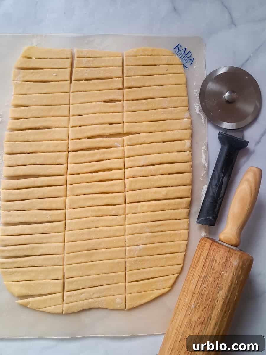 Homemade noodles rolled out and cut.