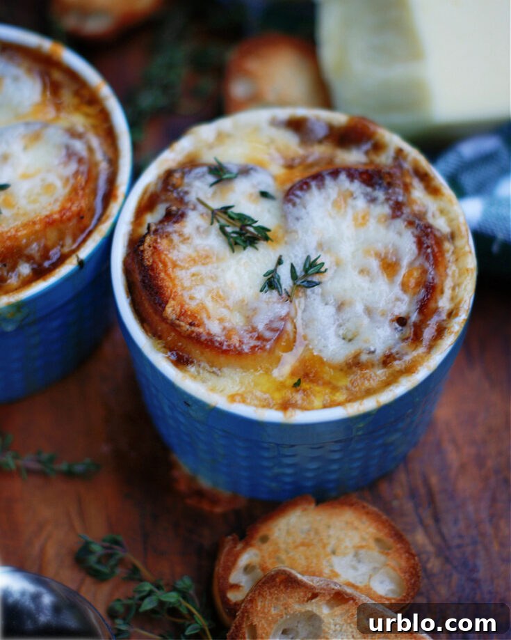 A classic comfort food recipe of carmelized onions, rich broth, oodles of melted cheese & crusty bread.