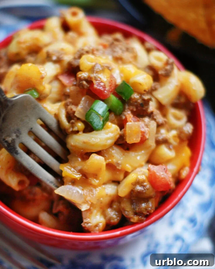This is the best Chili Mac recipe made on the stove top & finished under the broiler in less than 30 minutes.