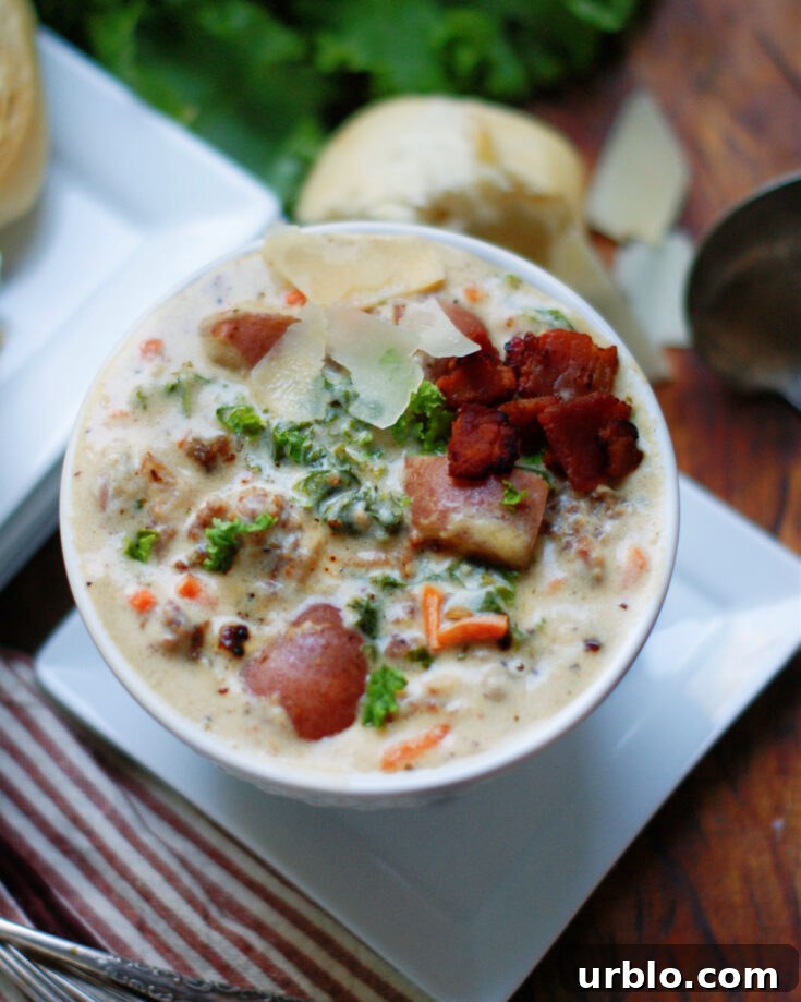 Tender kale, velvety potatoes, savory sausage and cream make a rich hearty potato soup