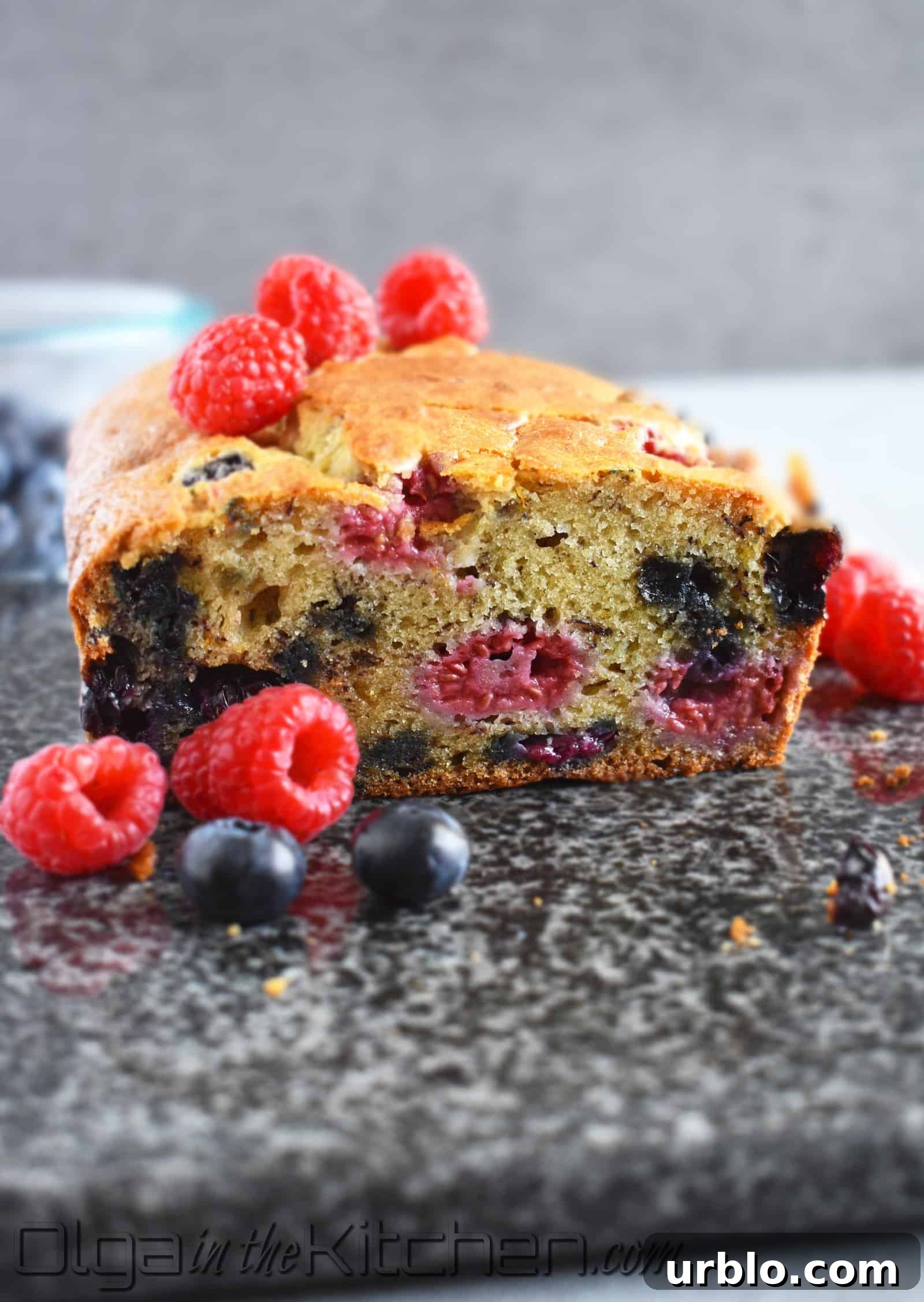Banana Berries Bread: incredibly moist loaf of banana bread loaded with juicy and fresh blueberries and raspberries with a hint of orange.