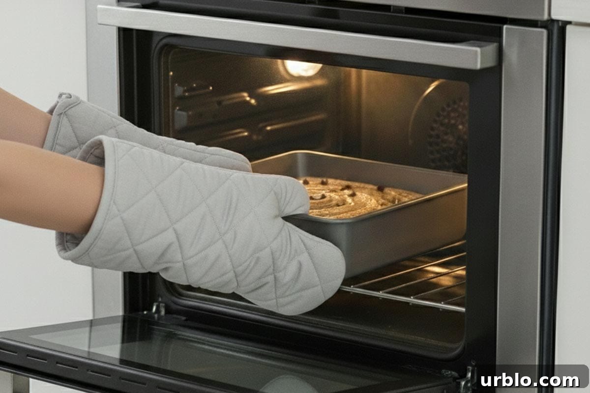 Placing the tray into the oven.