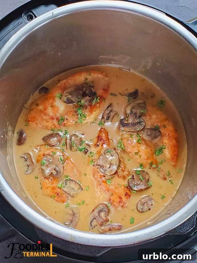 creamy chicken marsala in instant pot garnished with parsley
