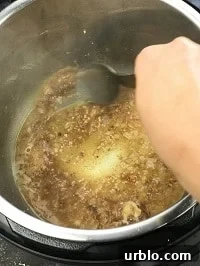 deglazing pot with a steel ladle