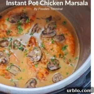 creamy chicken marsala in instant pot garnished with fresh parsley