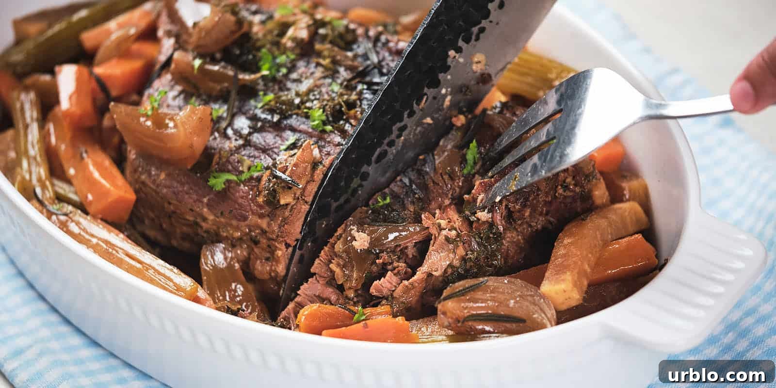21 Crowd-Pleasing Potluck Recipes That Outshine Store-Bought Dishes 11 A picture of Slow Cooker Pot Roast with carrot and parsnip.