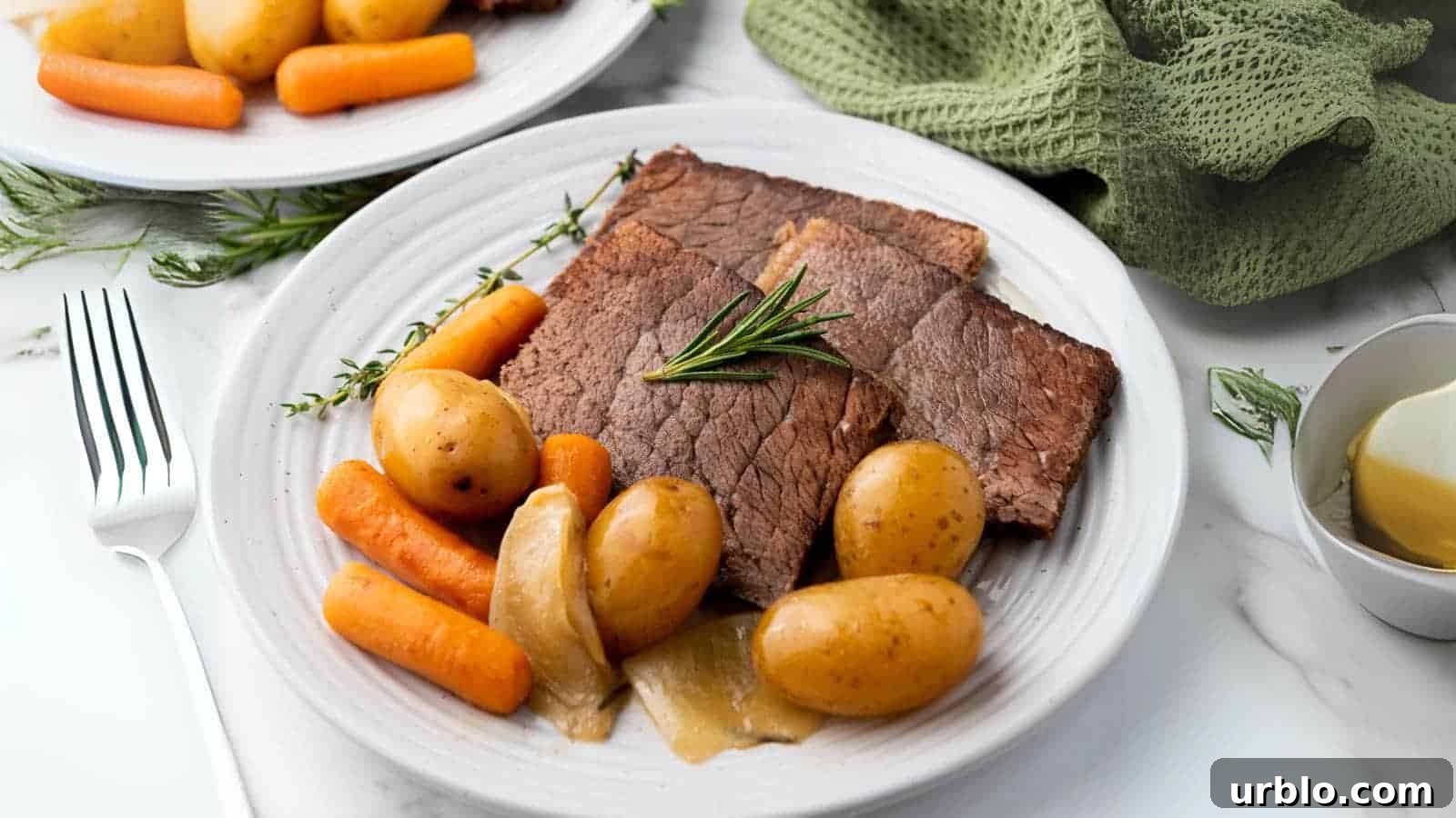 21 Crowd-Pleasing Potluck Recipes That Outshine Store-Bought Dishes 18 A plate with sliced rump roast, baby potatoes, carrots, and onions, garnished with a sprig of rosemary.