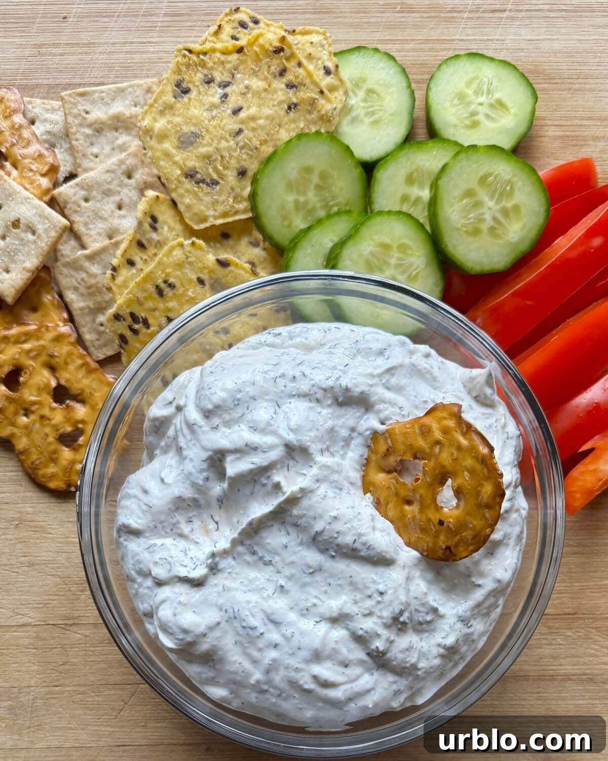 Quick 5-Minute Creamy Dill Dip Recipe for Parties and Snacks 10 A pretzel in sour cream dip.