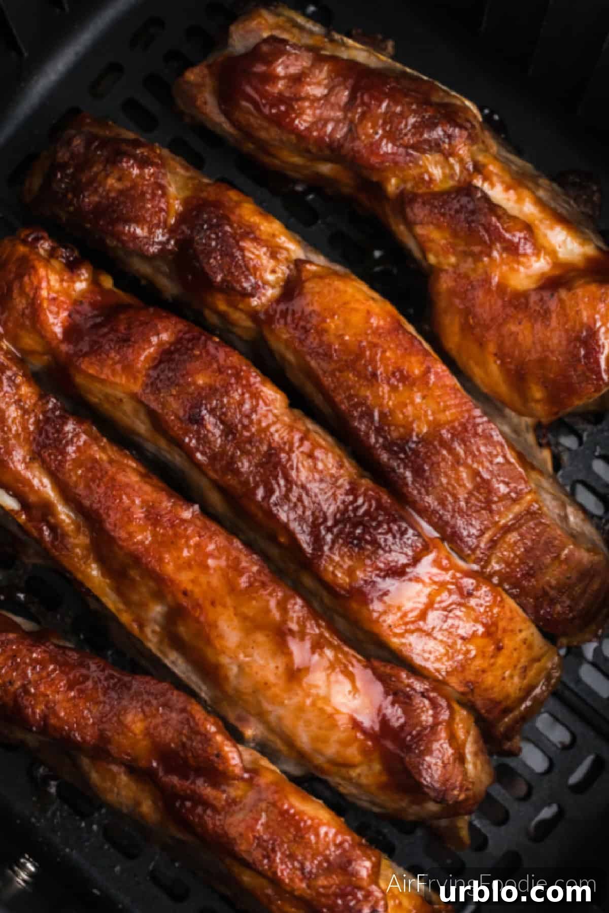 Reheating ribs in air fryer basket.