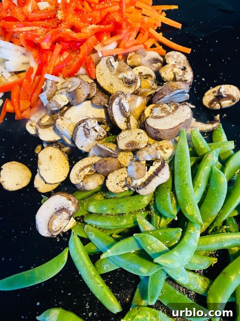 veggies on the griddle before cooking