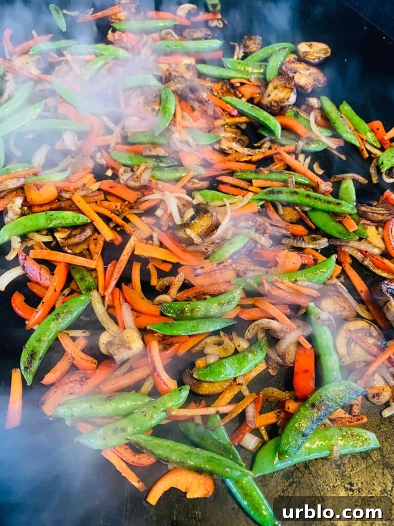 cooked veggies on the griddle
