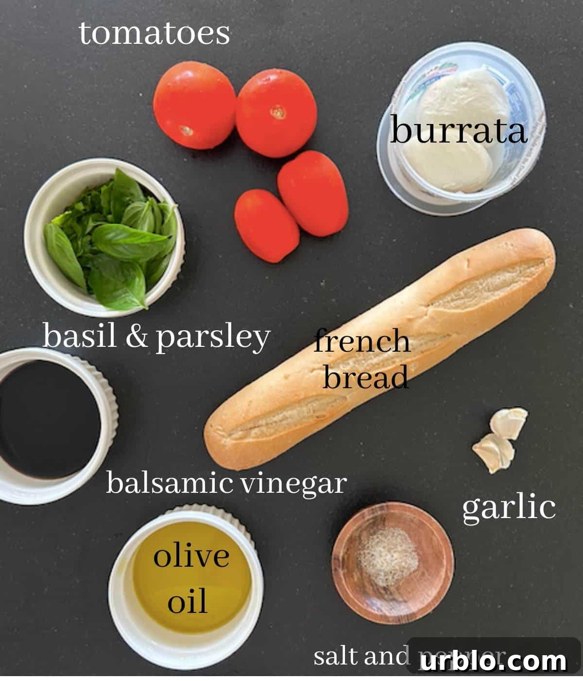 Ingredients for burrata bruschetta on countertop.