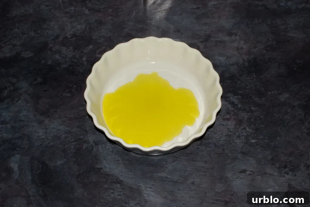 Olive oil poured in an oven proof dish